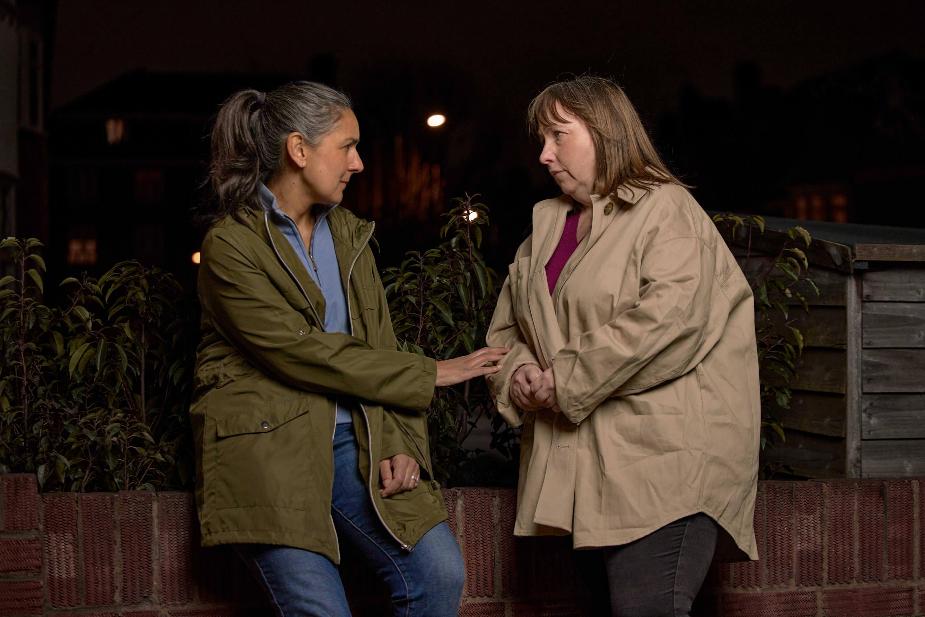 Banner image Woman giving support to another woman.